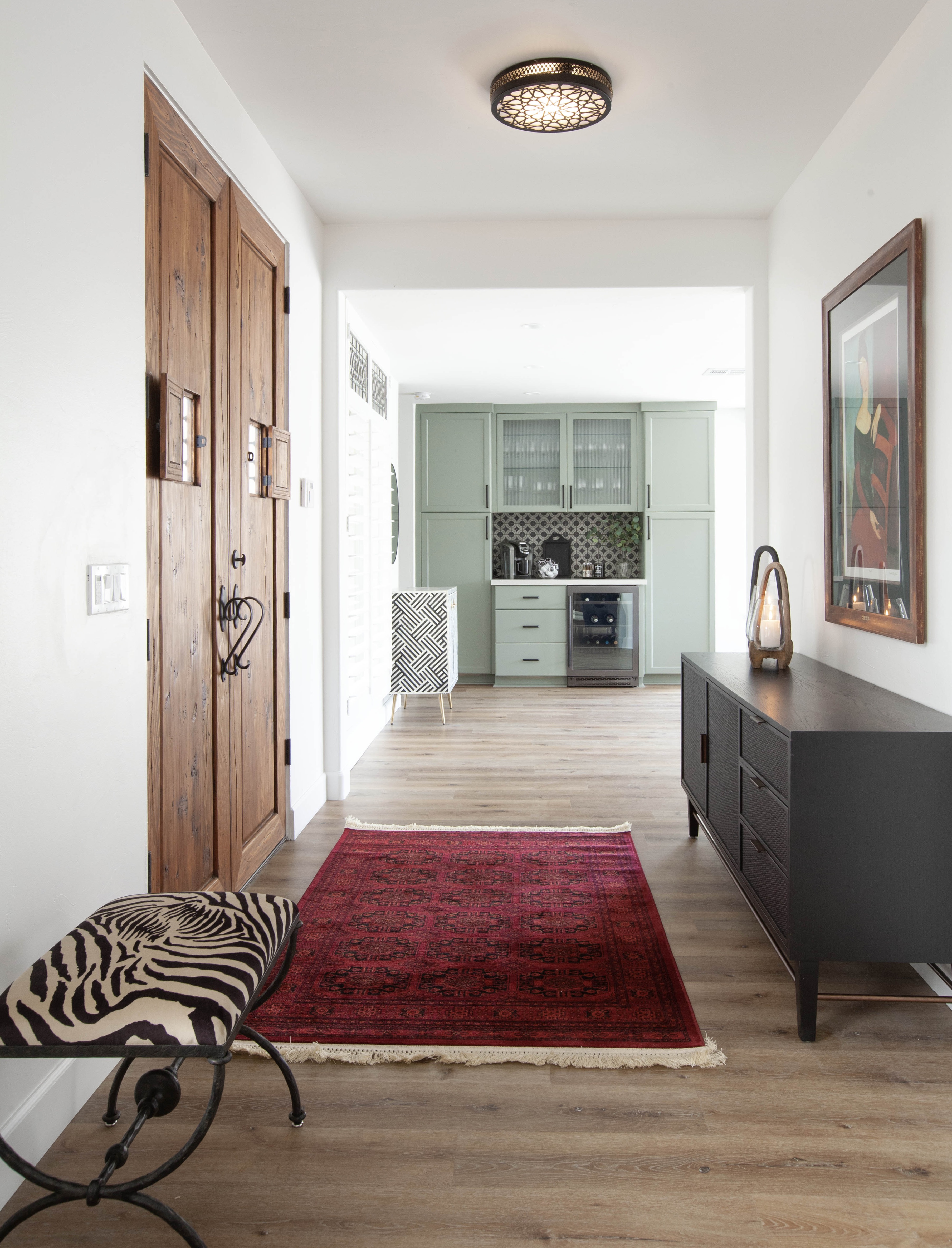 Room Addition & Whole-Home Renovation — inside entry hall looking toward the sage green coffee bar