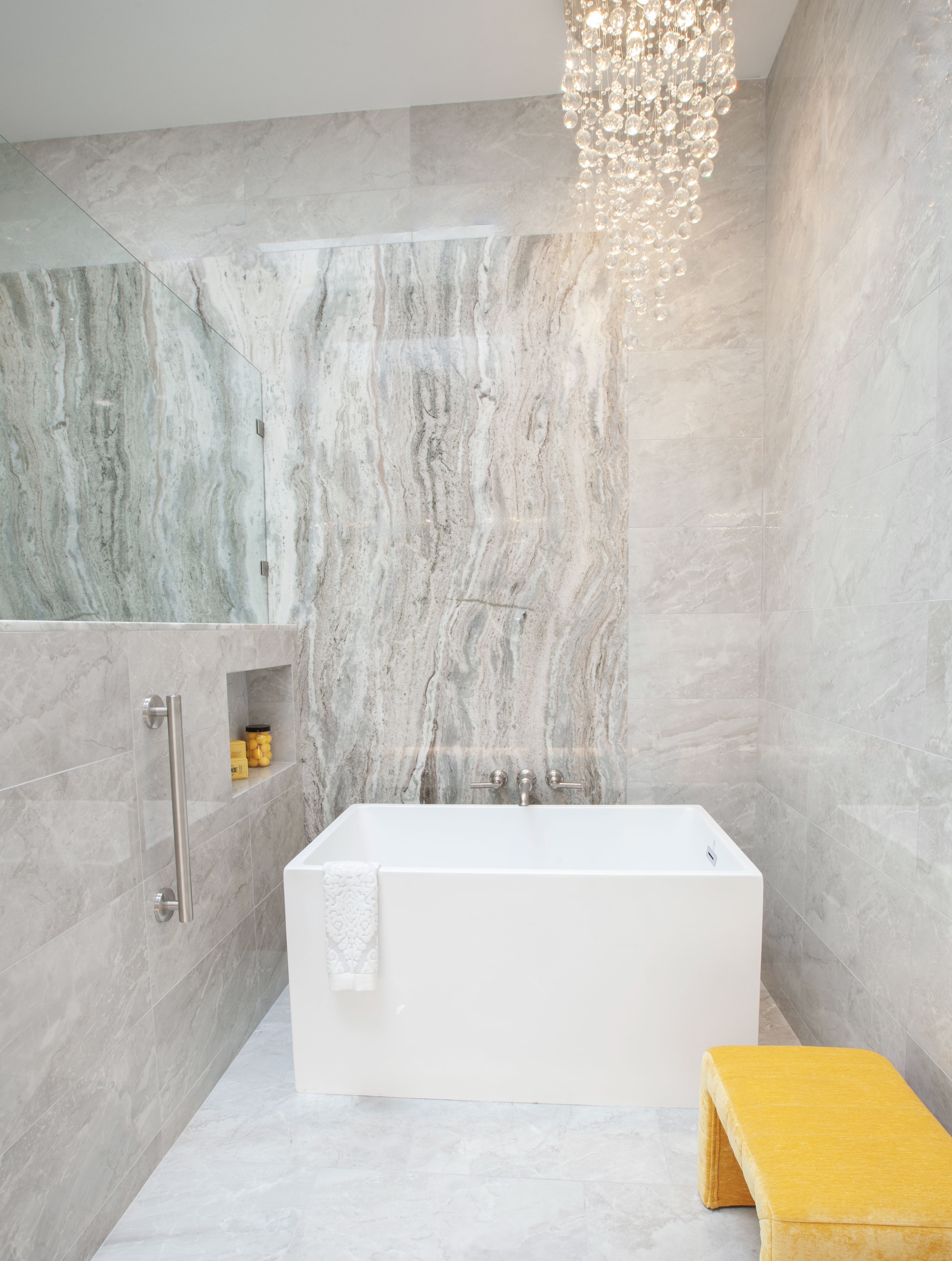 Multi-Bathroom Renovation — elegant soaking tub with crystal chandelier